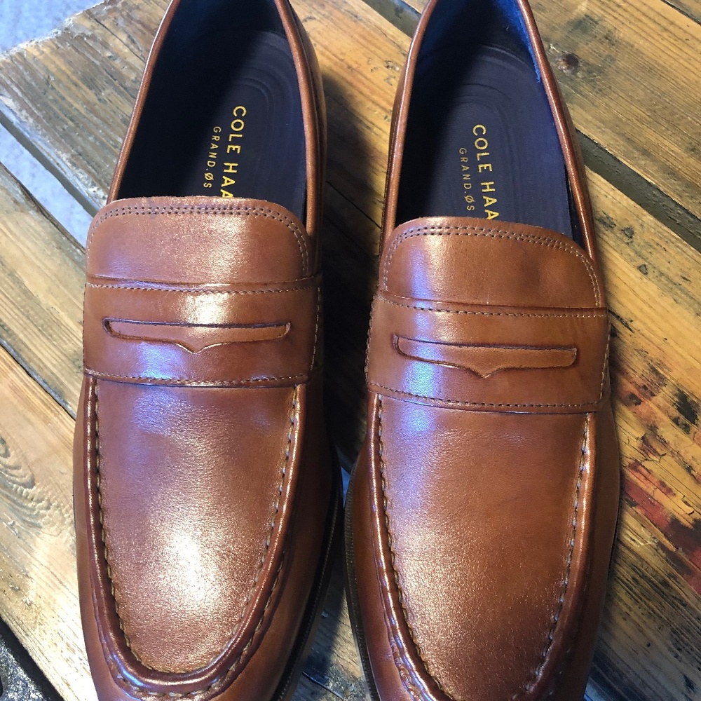 Never worn/new Cole Haan Grand Os slip ons.